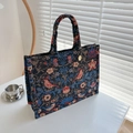 Navy blue floral bird jacquard tote bag with vintage embroidery and gold logo charm - Black