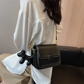 Minimalist black leather square crossbody bag with white contrast stitching and charm - Black With Pendant