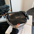 Chic black crossbody bag in oil wax leather with bold silver chain strap detail - Black