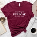 Flat lay of wine red cotton T-shirt with white religious print and lifestyle props - Burgundy