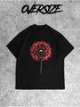 Detail van oversized zwart katoenen T-shirt met levendige rode paardenbloem grafische print - S / Zwart