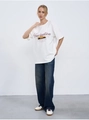 Dettaglio di t-shirt in cotone con stampa di auto d'epoca e scritta Fascination - S / Bianco