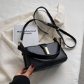 Minimalist black faux leather shoulder bag with gold hardware buckle and handle - Black