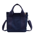 Navy blue canvas tote bag with front pocket and adjustable shoulder strap for daily use - Klein Blue