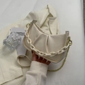 Chic beige ruched cloud bag with thick resin chain and gold metal strap detail - Beige