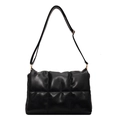 Modern black quilted crossbody bag with adjustable wide strap and gold-tone hardware - Black