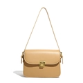 Elegant khaki leather crossbody bag with vintage bronze square buckle on white background - Yellow