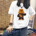 Detalle de camiseta de algodón blanco con estampado de oso animado y texto Sezo HAPPY - 3XL / Oso Blanco con Sombrero