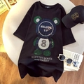 Détail d'un t-shirt oversize en coton noir avec un motif ours en strass étincelants - Noir
