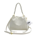 Cream white bucket bag with braided handle, plush charm and adjustable shoulder strap - Off White