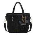 Chic black crossbody bucket bag with gold accents and a cute dog charm pendant - With Pendant / Black
