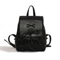 Women's black faux leather drawstring backpack with silver eyelets and bow details - Small / Black