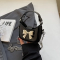 Mini black patent leather crossbody bag with oversized silver metallic bow detail - Black