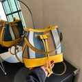 Contrast color bucket bag in yellow and blue striped canvas with adjustable strap - Green