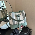 Mint green color-block bucket bag with canvas texture and thin leather shoulder strap - White