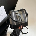 Chic bucket bag with black and white woven stripes and adjustable leather strap - Black Blue