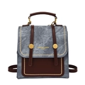 Vintage style blue denim and brown leather backpack with gold rivets and handle - Blue