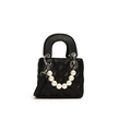 Quilted black bucket handbag featuring a pearl chain and silver metal hardware details - Black