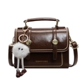 Vintage dark brown rectangular underarm bag with gold rivets and plush monster charm - Brown