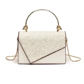 Elegant white sequin handbag with gold circular metal handle and chain strap for women - White