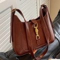 Borsa a spalla retrò in ecopelle caramello con finitura lucida e chiusura a pistone oro - Marrone
