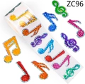 Macro view of laser laser music note stickers with colorful glitter finish on roll - Laser Music Note Style (ZC96)
