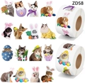 Close-up of 16 assorted cat Easter stickers featuring bunny ears and spring flower designs - 16 Designs (ZD58)