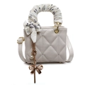 Quilted cream mini shoulder bag with silk scarf handle and elegant pearl charm detail - Off White