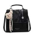 Minimalist black nylon backpack with teddy bear pendant and premium shoulder straps - With Pendant / Black