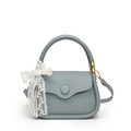 Chic foggy blue textured leather crossbody bag with a white lace bow decoration - Blue