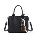 Black litchi-grain leather bucket bag with woven charms and detachable shoulder strap - Black