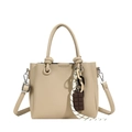 Beige bucket bag in lychee pattern faux leather with creative chocolate pendant - Cuba Sand