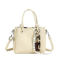 Retro cream white bucket bag with pebble leather texture and designer knot handle charm - Beige Apricot