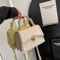 Fashionable square structured handbag in cream white and soft yellow with golden ring lock - Off White