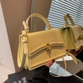 Fashionable beige small square crossbody bag with elegant gold metal ring buckle clasp - Yellow