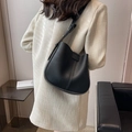Sac seau noir minimaliste en cuir à motif litchi avec bandoulière réglable pour femme - Noir