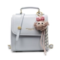 Hellblauer Mini-Rucksack aus PU-Leder mit goldenen Beschlägen und lila Plüsch-Anhänger - Mit Anhänger / Blau