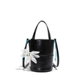 Black glossy crinkled leather bucket bag with blue drawstring and petal charm detail - Black