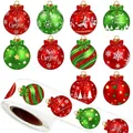 500-count Christmas sticker roll featuring red and green holiday patterns for gift wrapping - 1 Roll/1.2 Inch/3cm