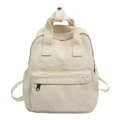 Cream white canvas backpack with front zipper pocket and reinforced top handles - Off White