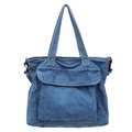 Large blue denim tote bag with front pocket and sturdy handles for everyday wear - Light Blue
