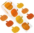 Makroaufnahme von kürbisförmigen Aufklebern mit orangefarbener Glitzerstruktur als Rolle - Y217