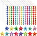 Dettaglio macro di adesivi olografici a stella con glitter e vari motivi emoji colorati - PZ64 (18*12cm)