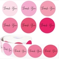 Close-up of pink gradient round Thank You stickers in a roll for gift box sealing - Pink Gradient (GG23)