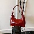 Dark red patent leather bucket bag with shiny finish and silver metal chain strap - Red (No Charm)