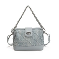 Quilted light blue denim crossbody bag with silver chain handle and metallic turn-lock - With Pendant / Blue