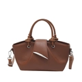 Brown litchi grain leather bucket bag with silver crescent buckle and knotted handle - Brown