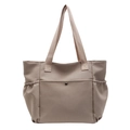 Large capacity canvas tote bag with front snap pocket and elastic side pockets in taupe - Khaki