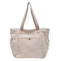 Minimalist beige nylon shoulder bag with side pockets and front snap closure for daily use - Off White
