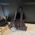 Dark brown high-gloss patent leather shoulder bag with silver star charm and bow detail - Brown